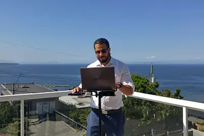 Edward Vega performing on-site LiDAR measuring for a BC permit project